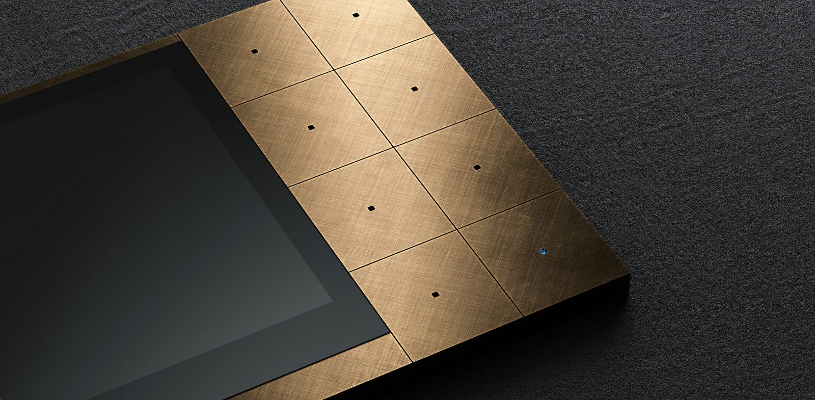HERITAGE keypad in cross-hatched copper beside a black glass screen